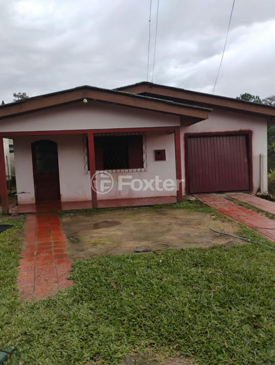 Casa à venda com 3 quartos, 117m² - Foto 1