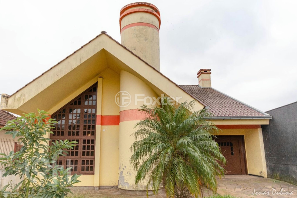 Casa à venda com 4 quartos, 330m² - Foto 1