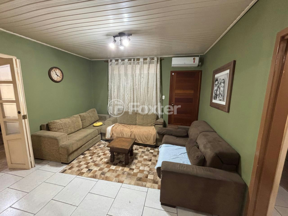 Casa à venda com 3 quartos, 129m² - Foto 1
