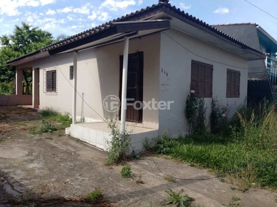 Casa à venda com 3 quartos, 100m² - Foto 1
