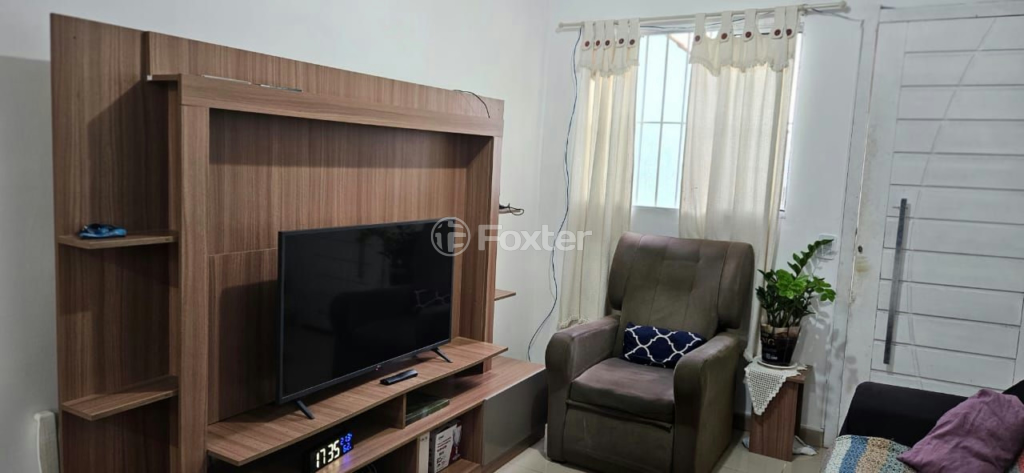 Casa à venda com 3 quartos, 70m² - Foto 4