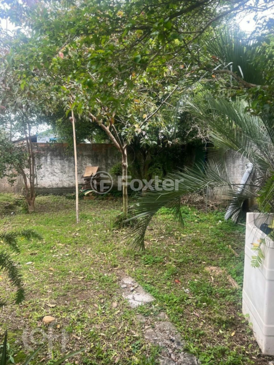 Casa à venda com 3 quartos, 100m² - Foto 1